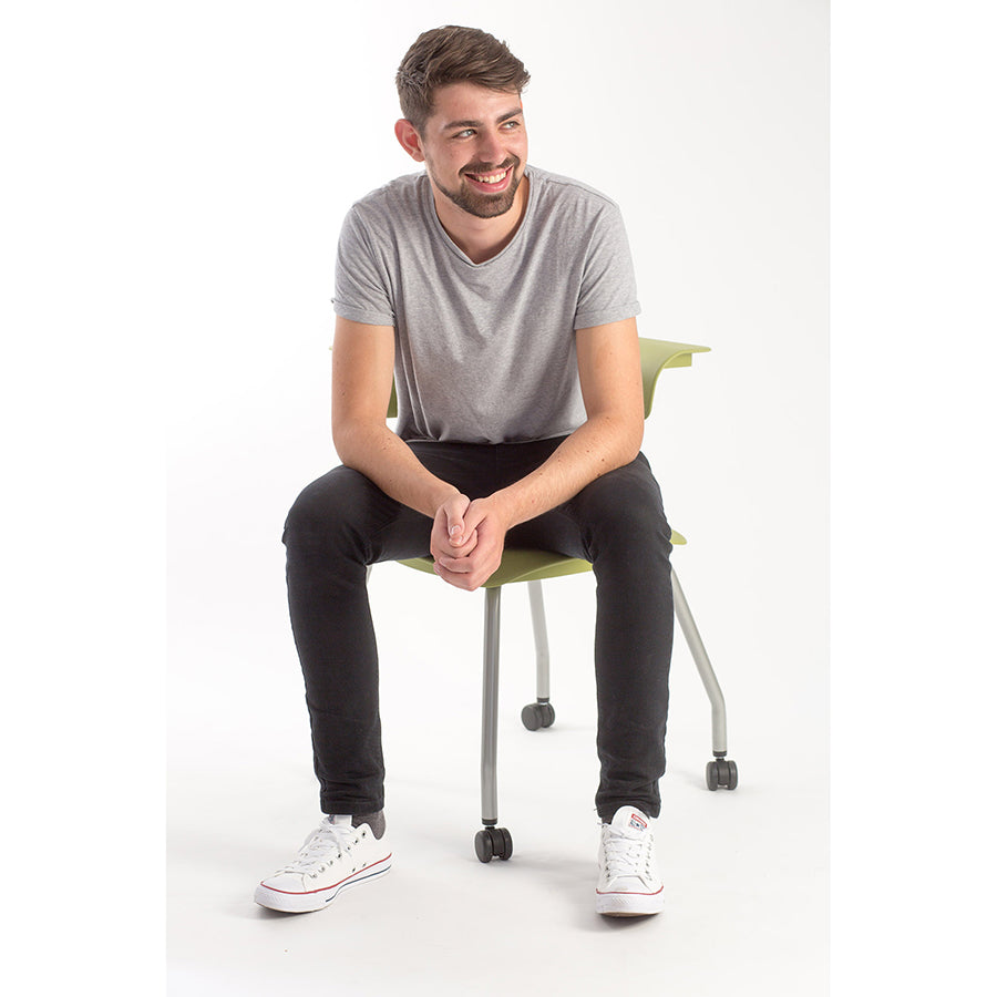 Ruckus 4 Leg Chair with castors starlight silver frame with zesty lime seat and back lifestyle image 4