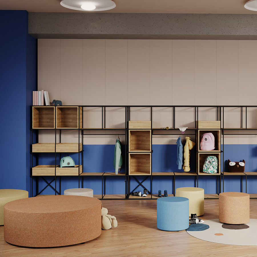 Modern interior design with wooden shelves, colourful Point Ottomans, and a blue wall.