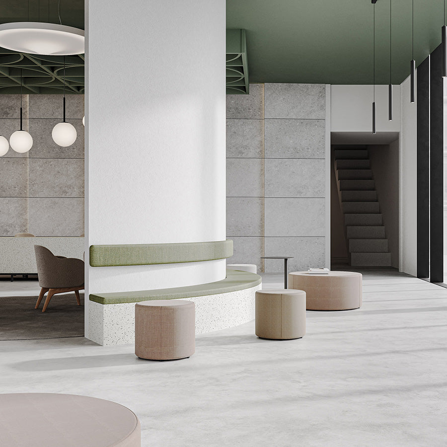 Modern interior with green bench and round Point ottomans or stools in a minimalistic setting