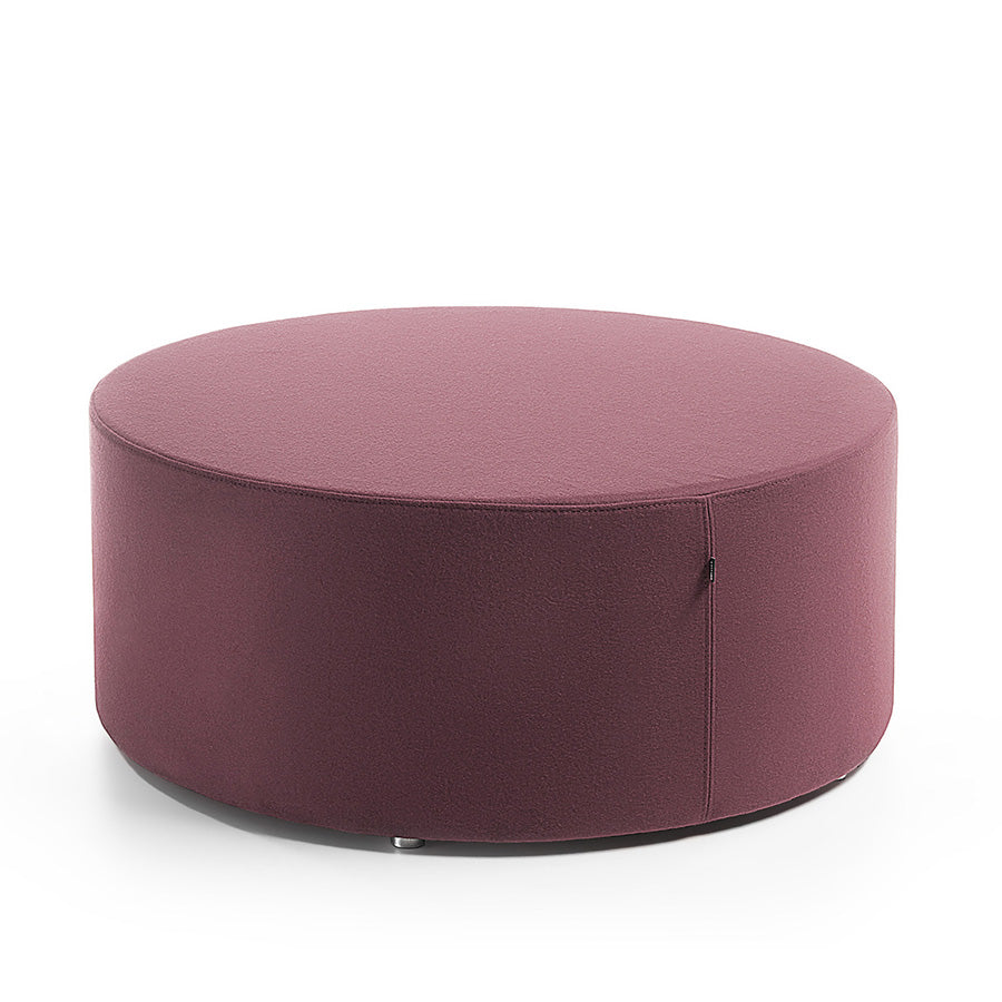 Round purple Point ottoman on a white background