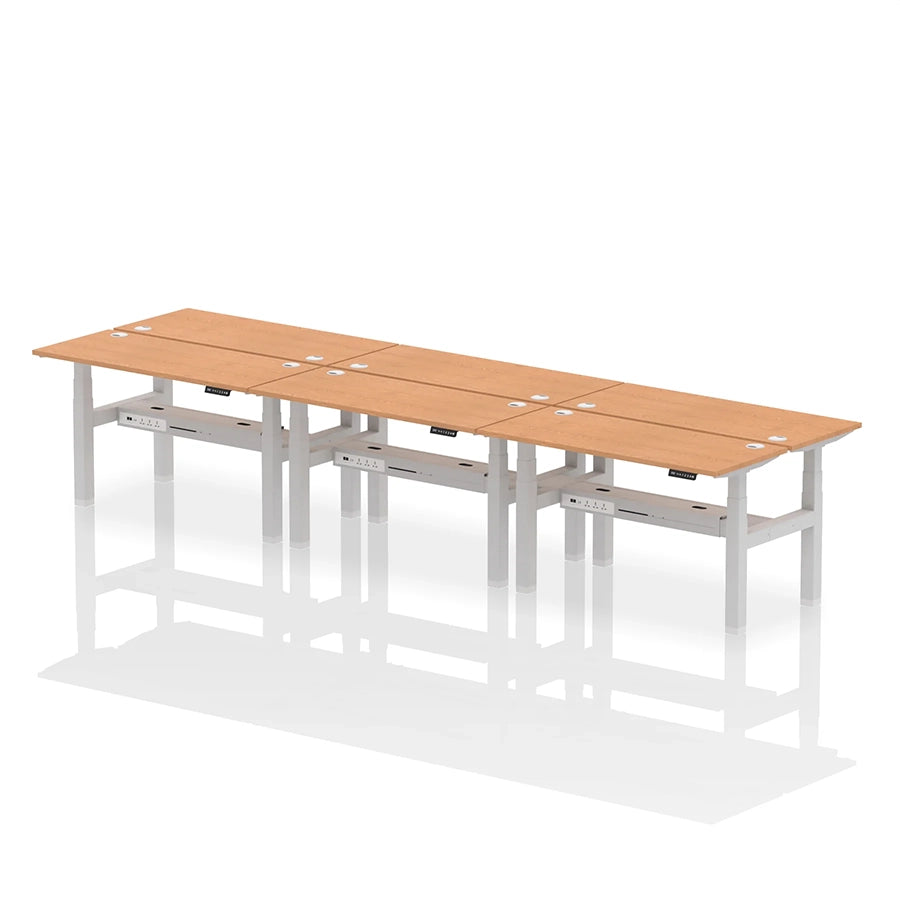 Air Back-to-Back Height Adjustable Bench Desk - 6 Person with cable ports W1400mm oak top with silver frame