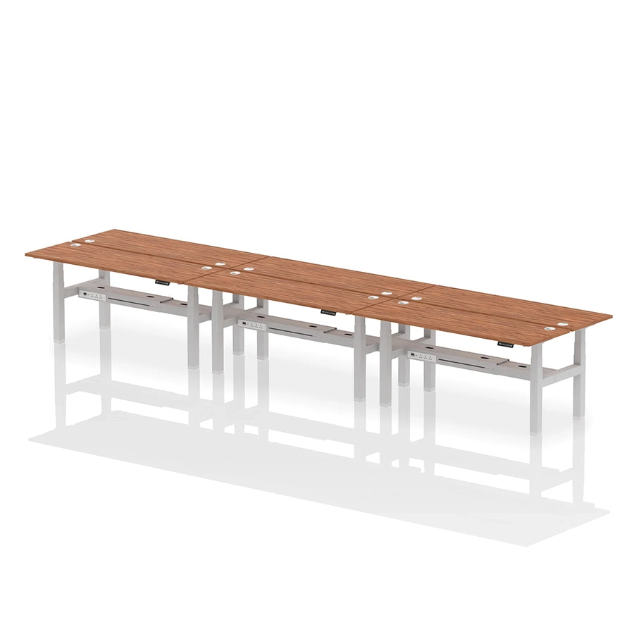 Air Back-to-Back Height Adjustable Bench Desk - 6 Person with cable ports W1800mm walnut top with silver frame