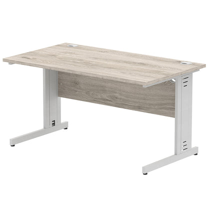 Impulse 1400mm Straight Desk Cable Managed Leg Grey Oak Table Top and Silver Frame