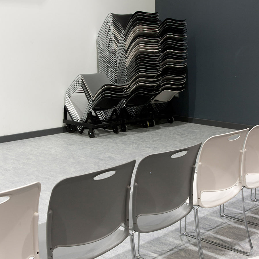 Maestro High Density Chair Poly Seat and Chrome Metal Frame Lifestyle Image Stacked on Transport Dolly's KI