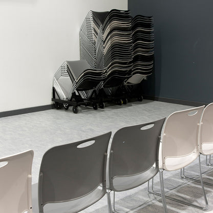 Maestro High Density Chair Poly Seat and Chrome Metal Frame Lifestyle Image Stacked on Transport Dolly's KI