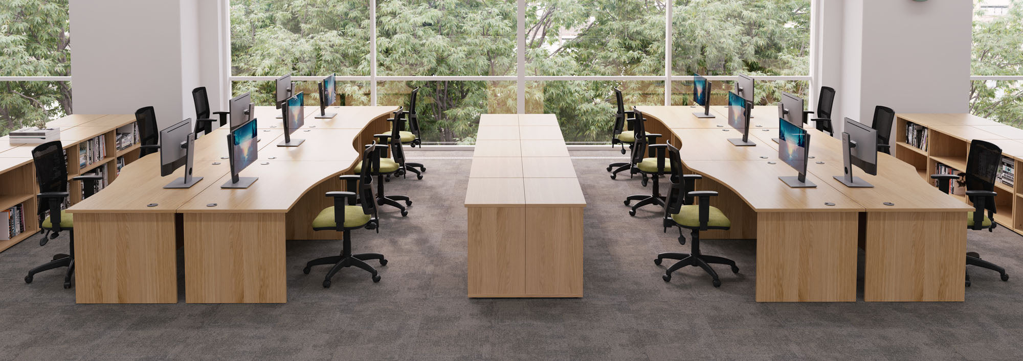 Modern office setup with wooden desks and chairs in a bright room with large windows.