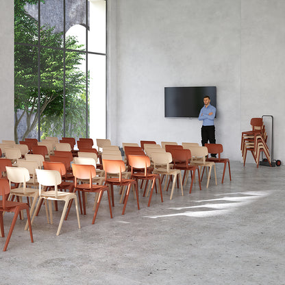 Sutton Chairs One Piece Polypropylene Terracotta and Latte colours in a row Lifestyle Shot